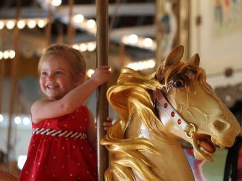 Child on carousel 